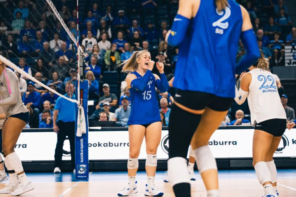 Kendra Wait amps up her teammates during a 2024 match at home. The Big East athletic conference recently named Wait its player of the year for the second consecutive year.<br />(Justin Kreutzian / Courtesy of Creighton Athletics)