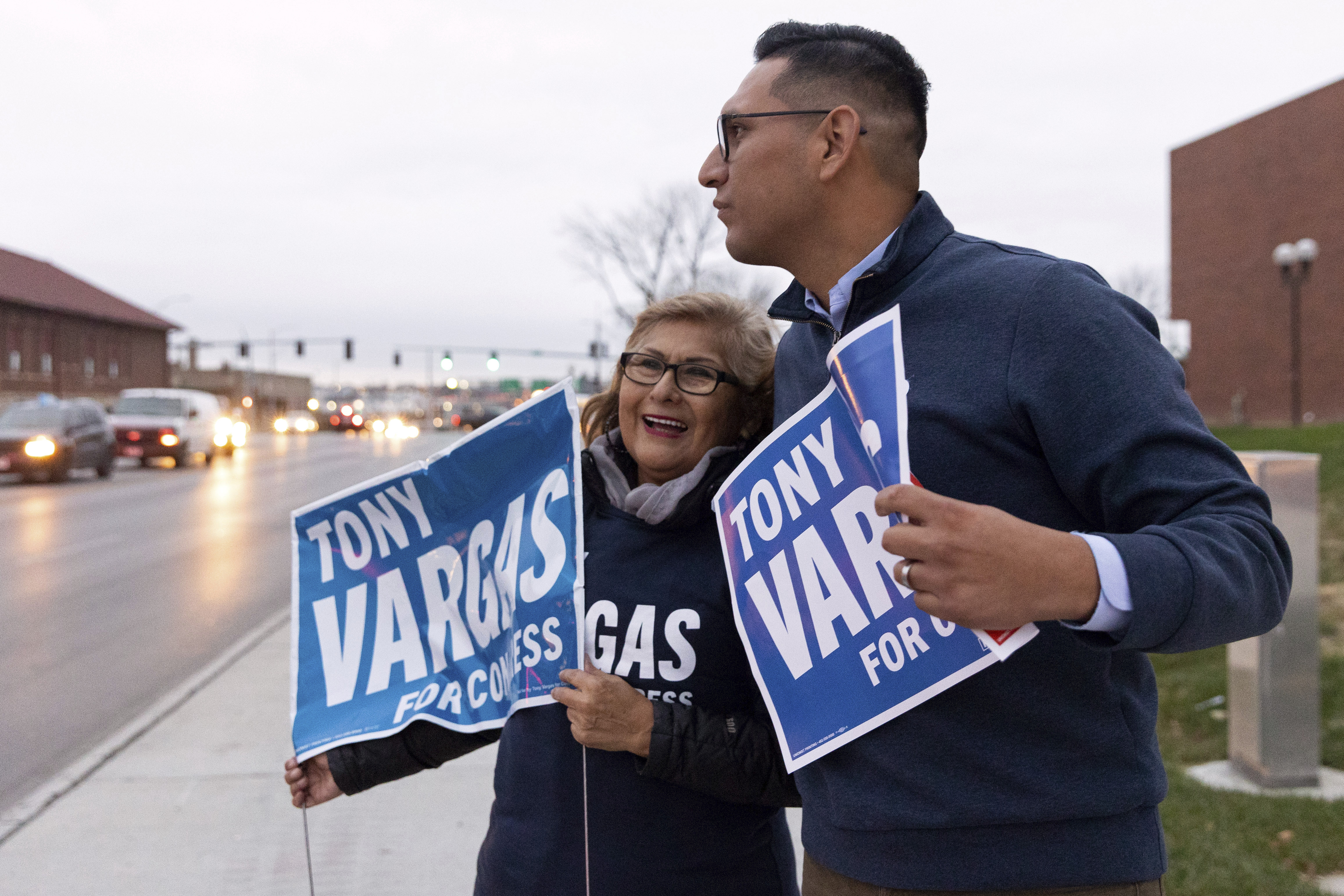 Democratic congressional candidate for Nebraska&#039;s 2nd district Tony Vargas (right) hugs his mother, Lidia Vargas, while campaigning in Omaha, Neb., Tuesday, Nov. 8, 2022.<br />(Eileen T. Meslar / Omaha World-Herald via AP)