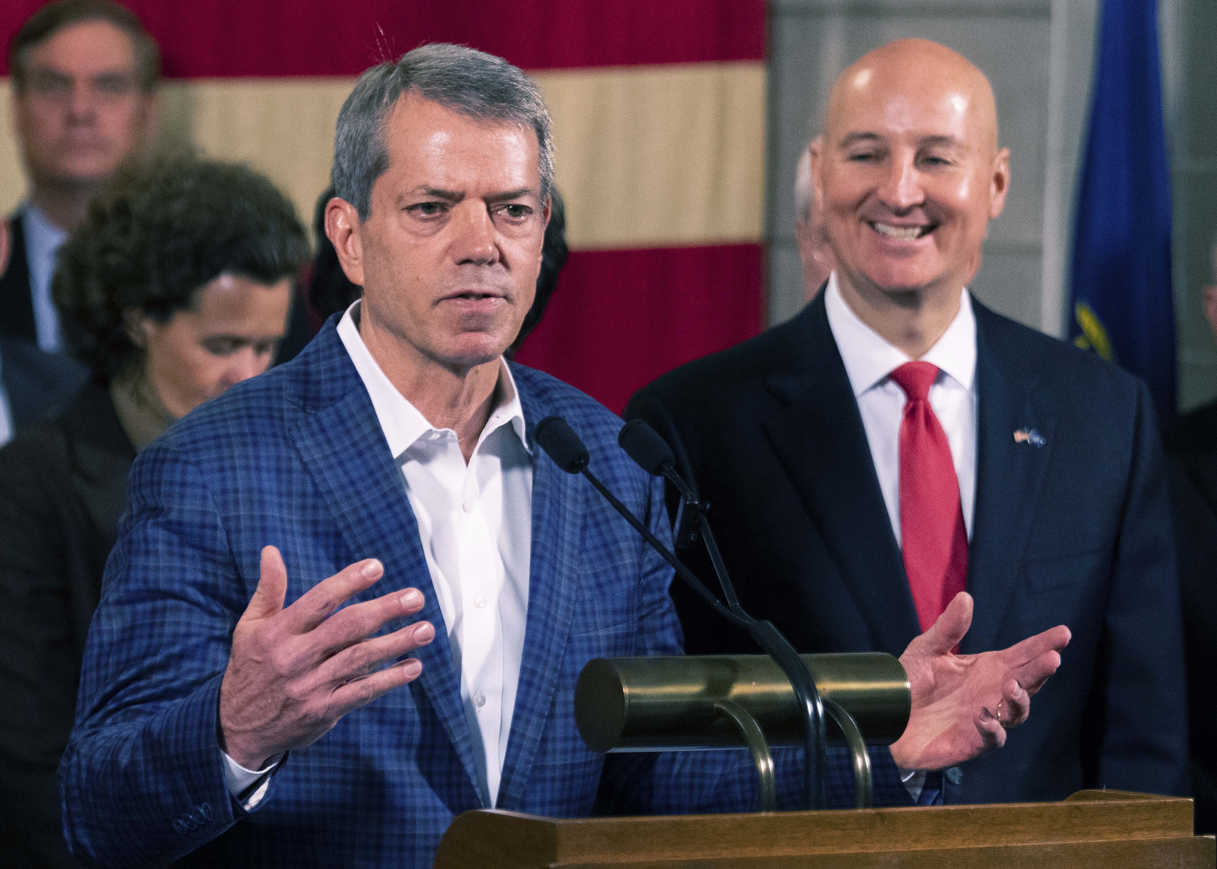 Governor Jim Pillen, left, announces the appointment of former governor Pete Ricketts, right, to Nebraska’s open senate seat, on Thursday, Jan. 12, 2023, at Nebraska State Capitol in Lincoln. The vacancy, left open by the departure of Ben Sasse, has been expected to go to Ricketts after his departure from the governorship last year.  (Kenneth Ferriera / Lincoln Journal Star via AP Photo)