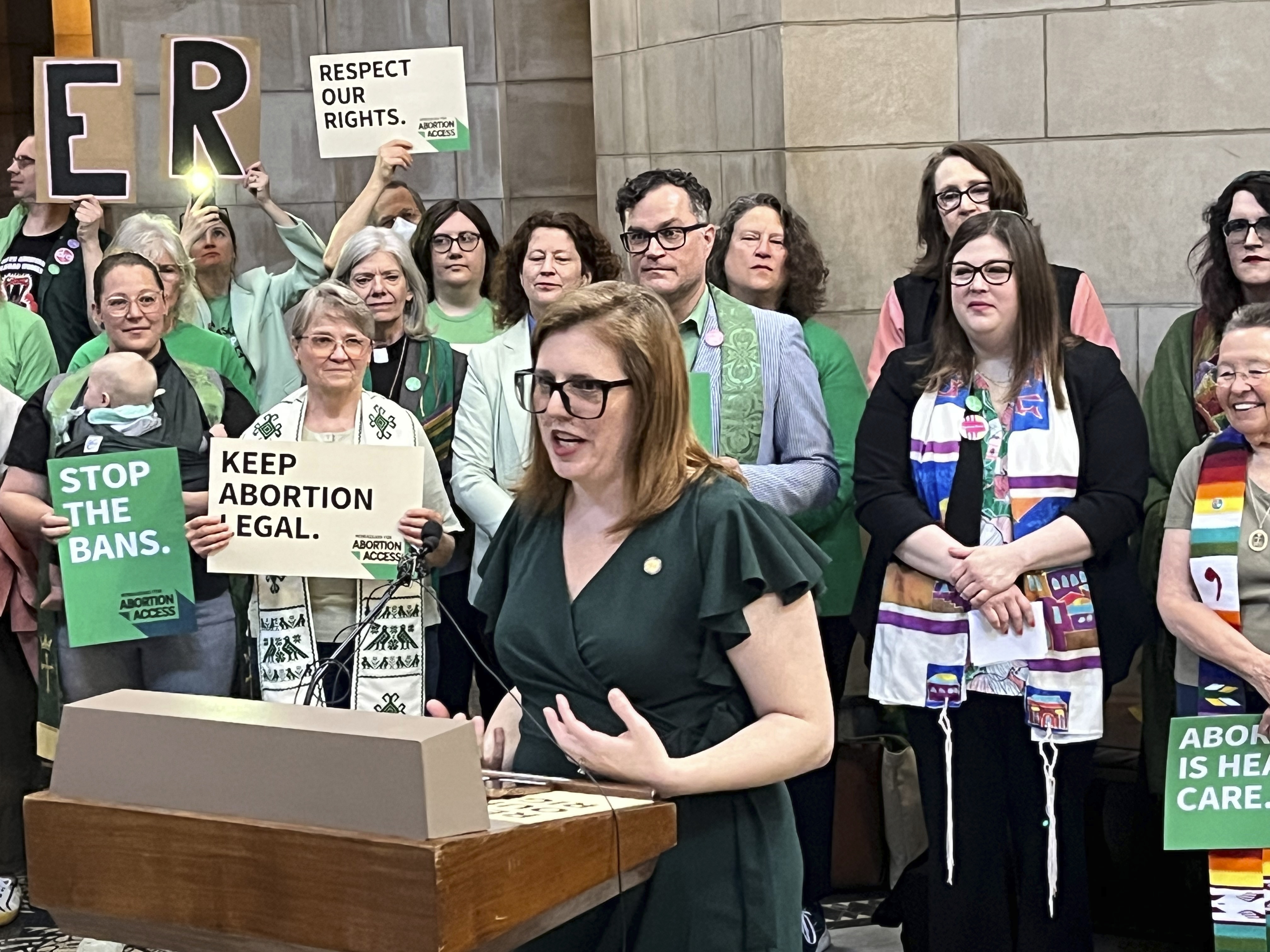 Sen. Machaela Cavanaugh, in the Nebraska state Capitol rotunda, during a rally to oppose the bill that would ban abortion once cardiac activity can be detected in an embryo, which is generally around the sixth week of pregnancy. (Margery A. Beck / AP Photo)