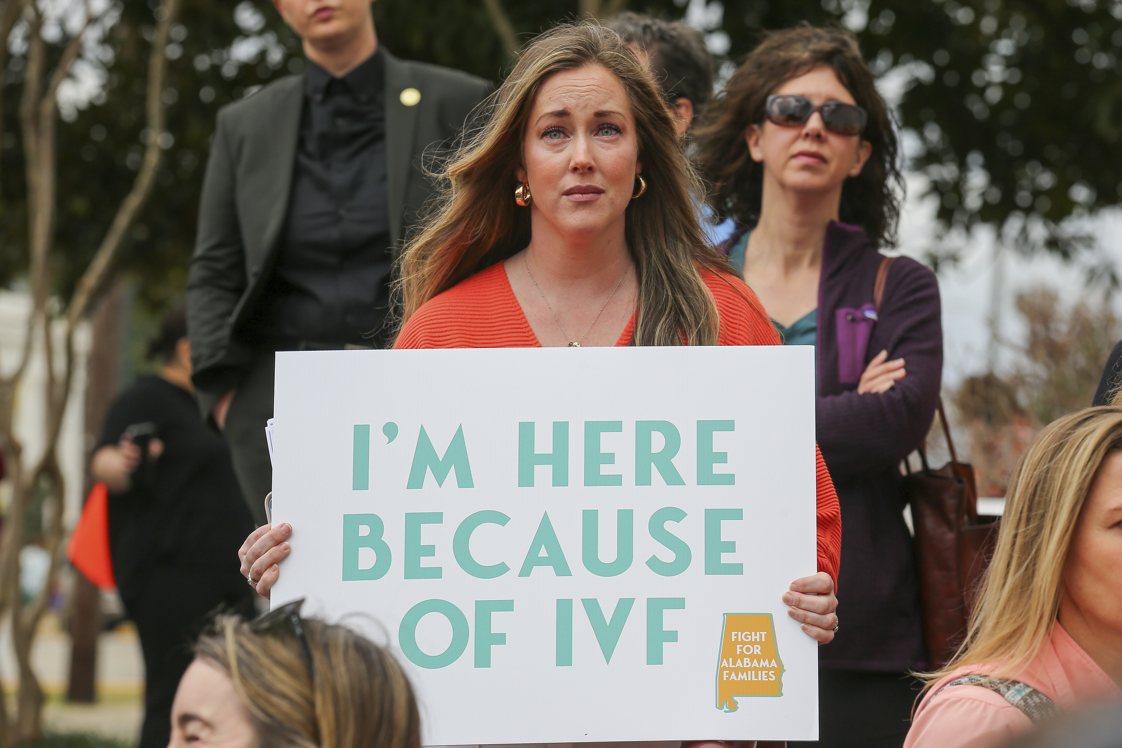 Sarah Brown, from Birmingham, Ala., holds a sign in support of IVF treatments during a rally advocating for IVF rights outside the Alabama State House on Wednesday, Feb. 28, 2024 in Montgomery, Ala. Brown has two children, age three and one, who were conceived using IVF at Birmingham Fertility center.<br />(Stew Milne / AP Images for RESOLVE: The National Infertility Association)
