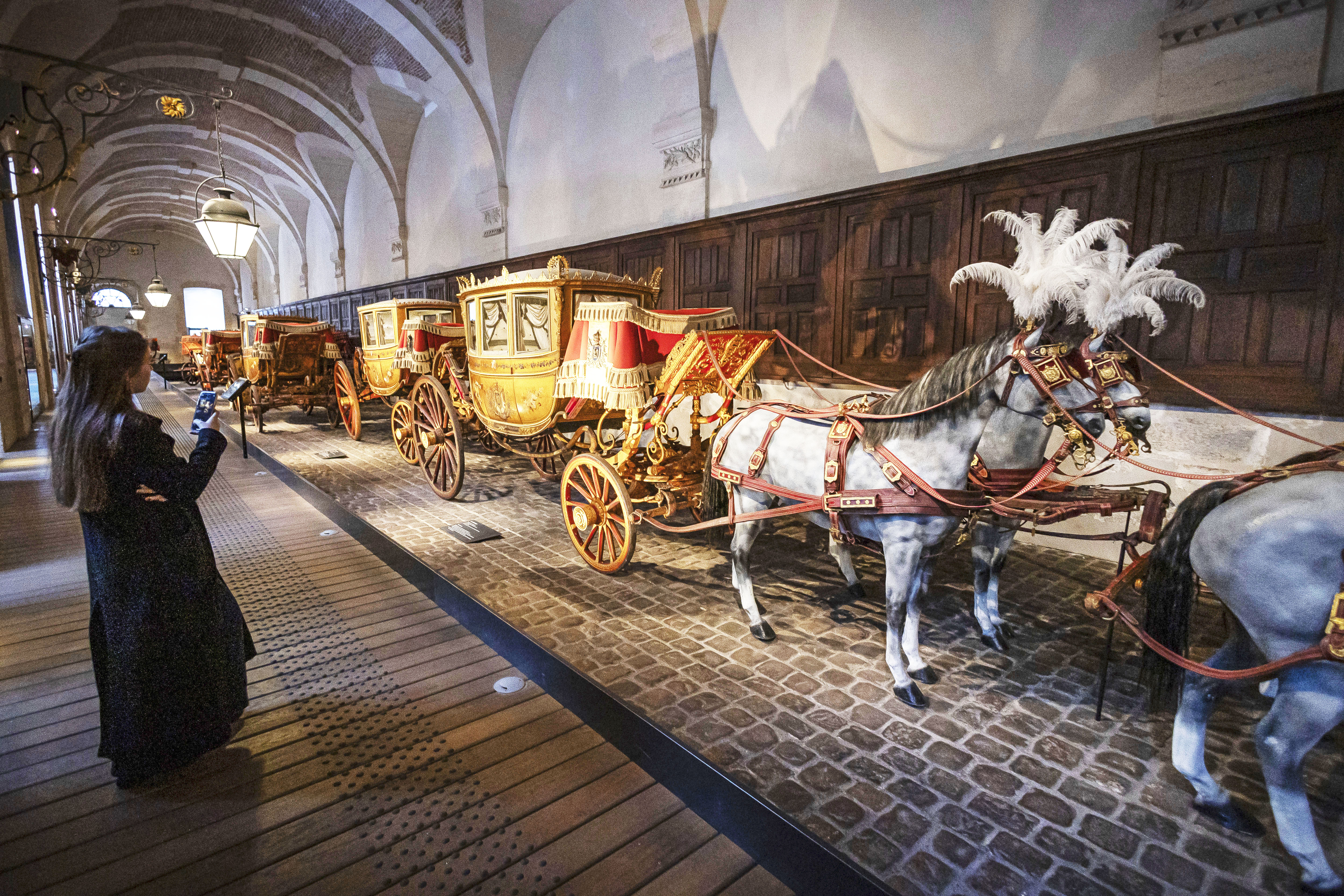 The gallery of Coaches in the Great Stables, in Versailles, Thursday, April 25, 2024. The Gallery of Coaches contains one of the largest collections of coaches in Europe.<br />(Aurelien Morissard / AP Photo)