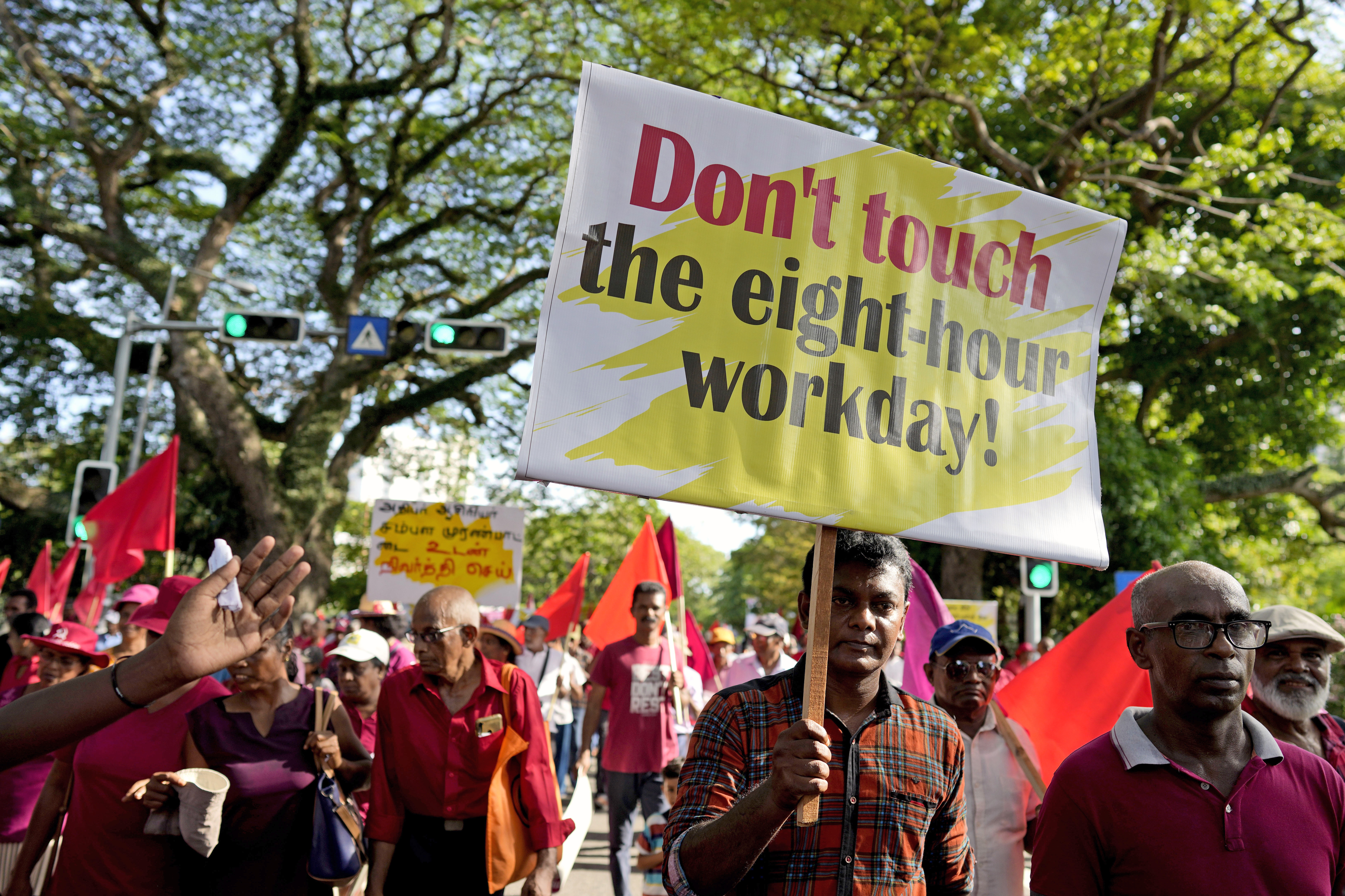 Members of National People’s Power, a political alliance, carry placards at a Labour Day rally in Colombo, Sri Lanka, Wednesday, May 1, 2024.<br />(Eranga Jayawardena / AP Photo)