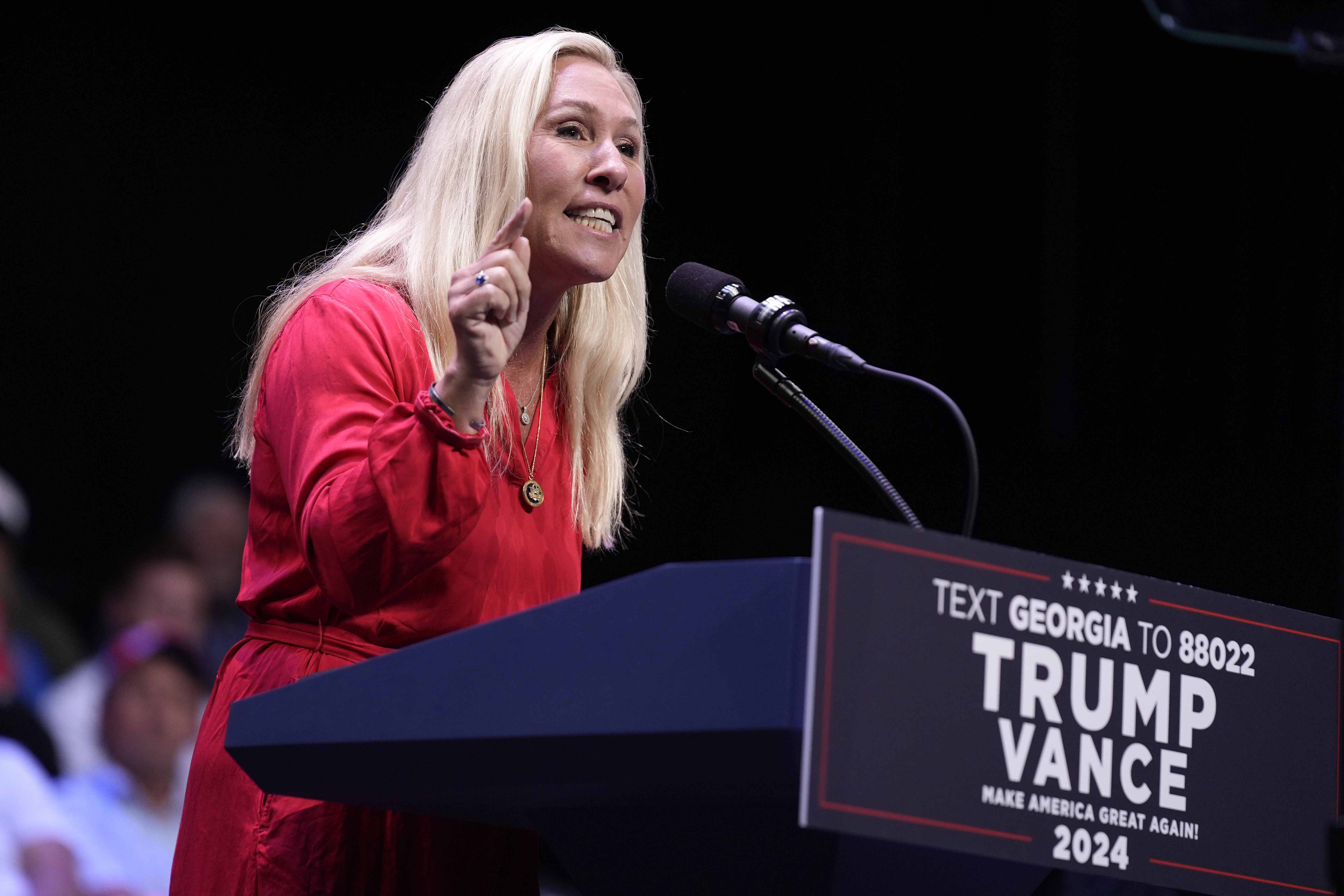 Rep. Marjorie Taylor Greene, R-Ga., speaks before Republican presidential candidate former President Donald Trump arrives to deliver remarks on the tax code, and manufacturing at the Johnny Mercer Theatre Civic Center, Tuesday, Sept. 24, 2024, in Savannah, Ga.<br /> (Evan Vucci / AP Photo)