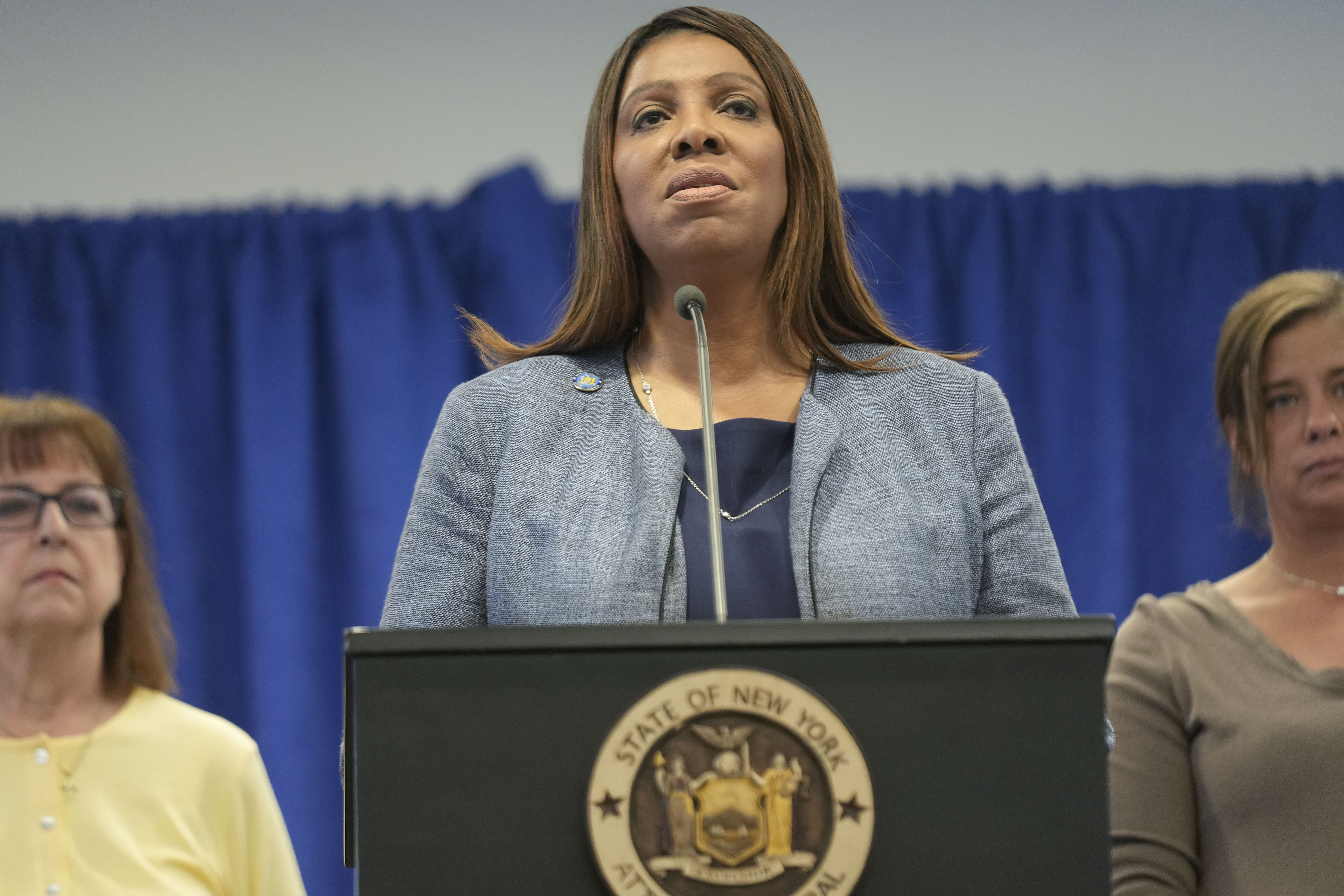 Surrounded by people involved with the fight against the opioid epidemic, New York Attorney General Letitia James (center) speaks about a settlement with regard to the opioid crisis at a news conference in New York, Thursday, Jan. 23, 2025.<br />(Seth Wenig / AP Photo)