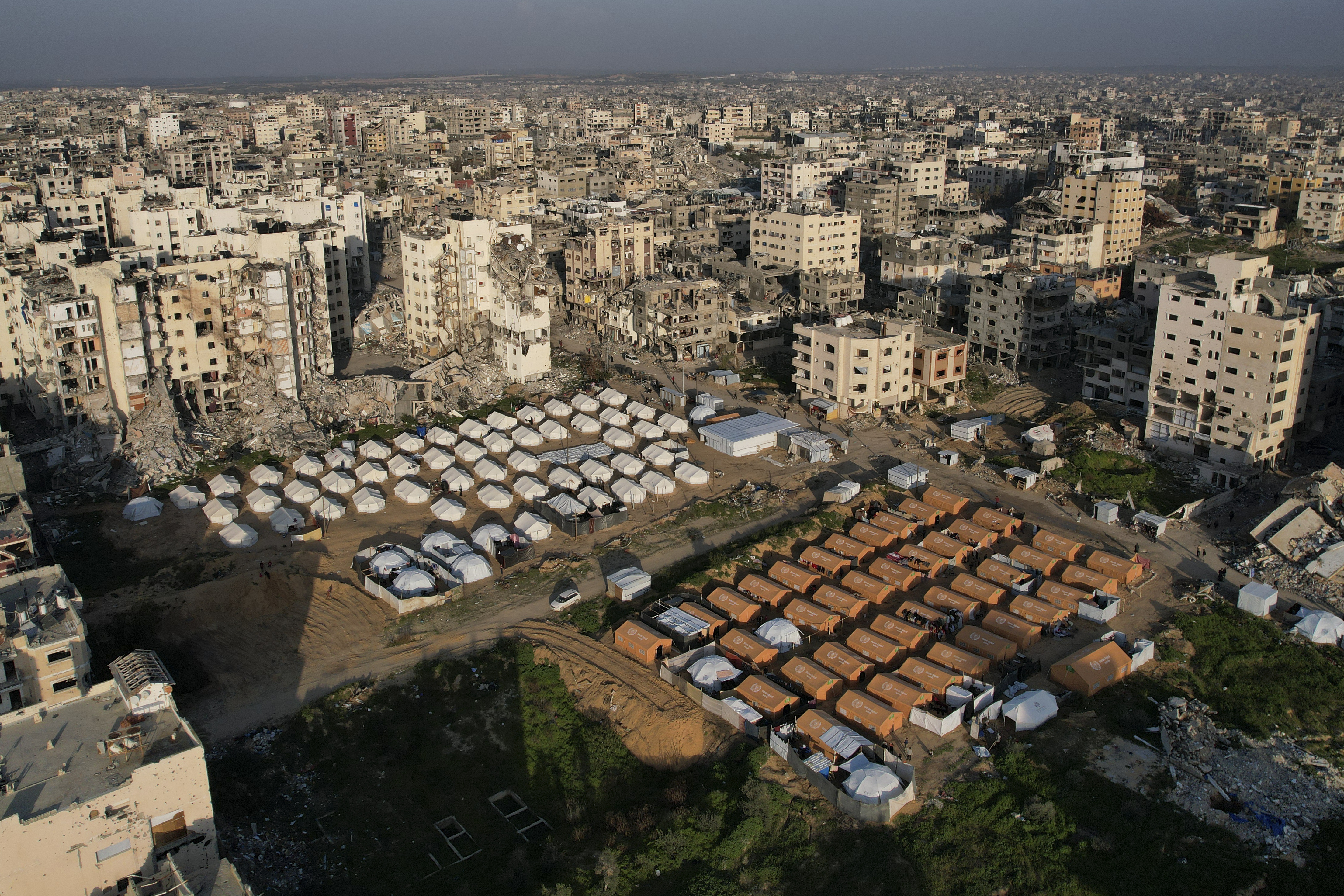 An aerial photograph taken by a drone shows a tent camp for displaced Palestinians amidst the destruction caused by the Israeli air and ground offensive in Beit Lahiya, northern Gaza Strip, on Monday, Feb. 17, 2025.<br />(Mohammad Abu Samra / AP Photo)