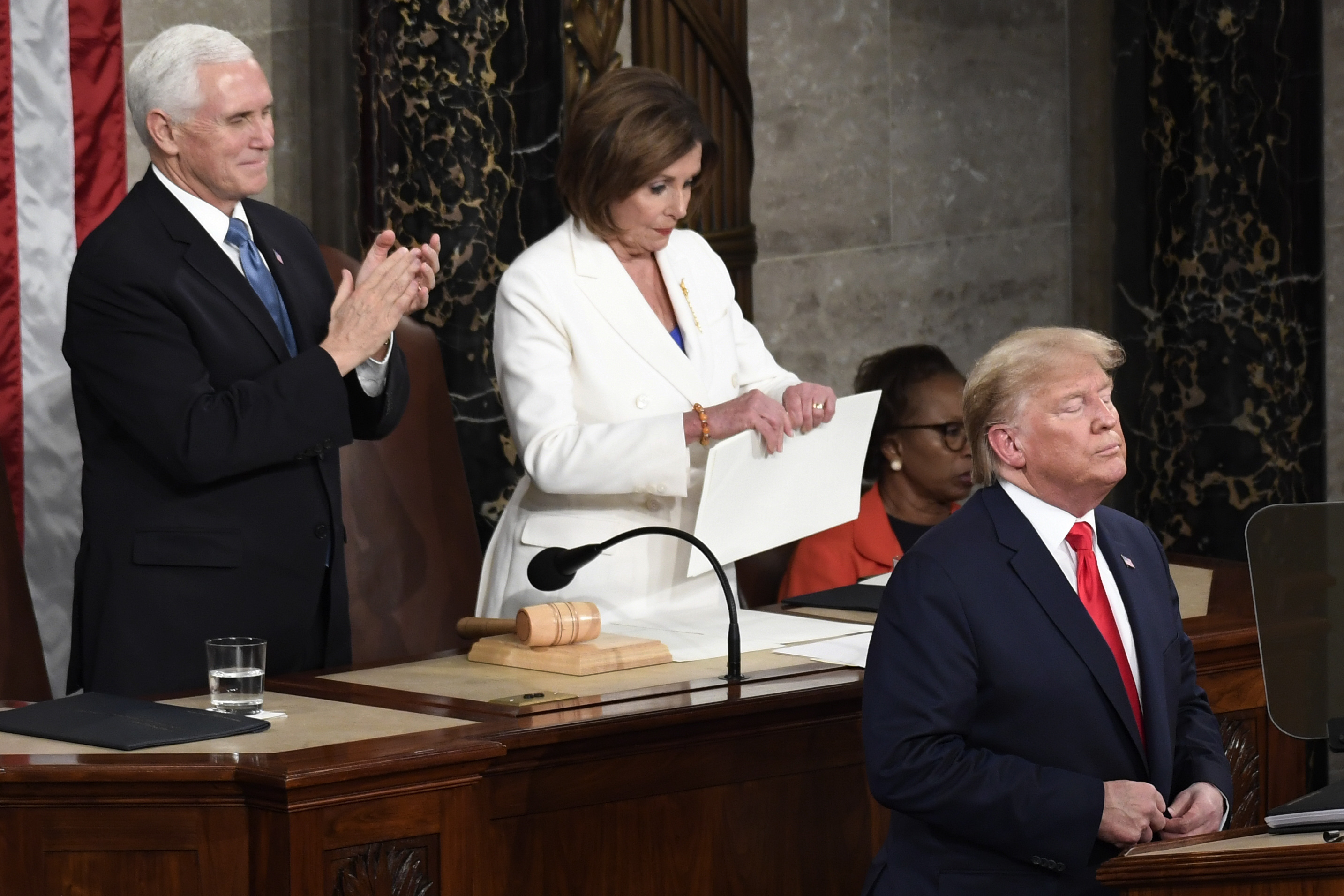 House Speaker Nancy Pelosi of Calif., tears her copy of President Donald Trump&#039;s State of the Union address after he delivered it to a joint session of Congress on Capitol Hill in Washington, Feb. 4, 2020, as Vice President Mike Pence is at left.<br />(Susan Walsh / AP Photo)
