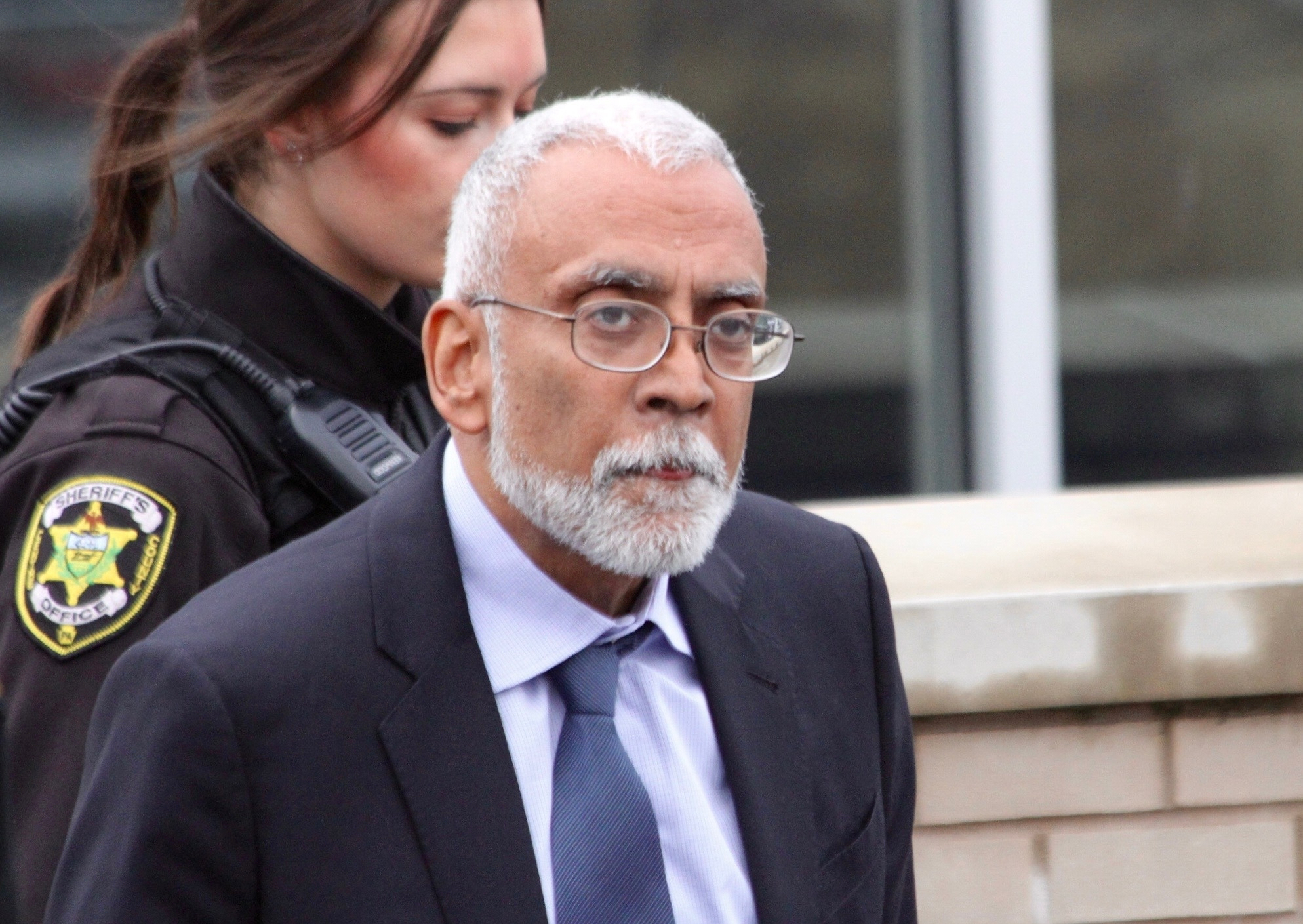 Subramanyam “Subu” Vedam walks outside the Centre County Courthouse in Bellefonte, Pa, on Feb. 6, 2025, during a hearing over new evidence uncovered in his 1983 murder case.<br />(Geoff Rushton / StateCollege.com via AP)