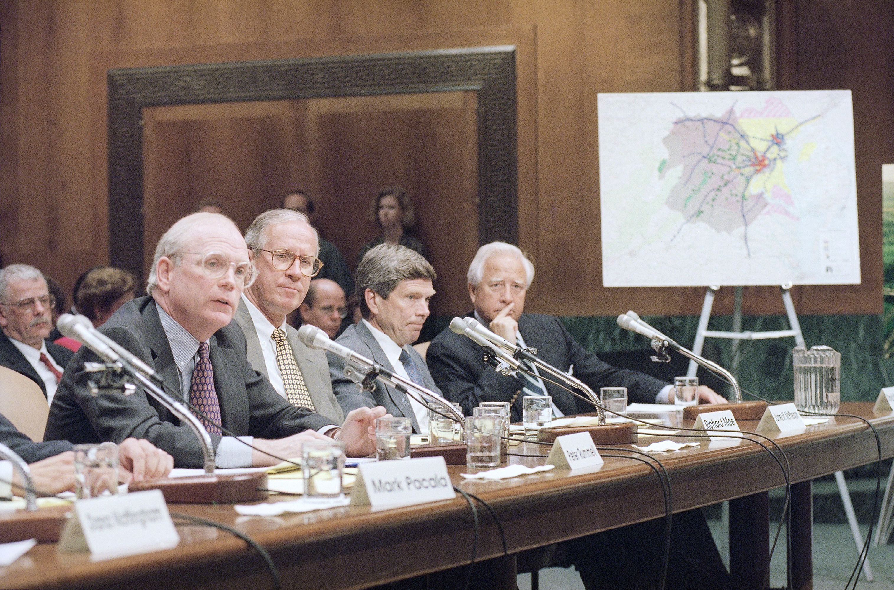 Peter Rummell, president of Disney design and development (left) accompanied by historians and preservationists, testifies on Capitol Hill in Washington, June 21, 1994, before a Senate Energy and natural resources subcommittee which was holding hearings on the proposed Disney America theme park near Haymarket, Va.<br />(John Duricka / AP Photo)