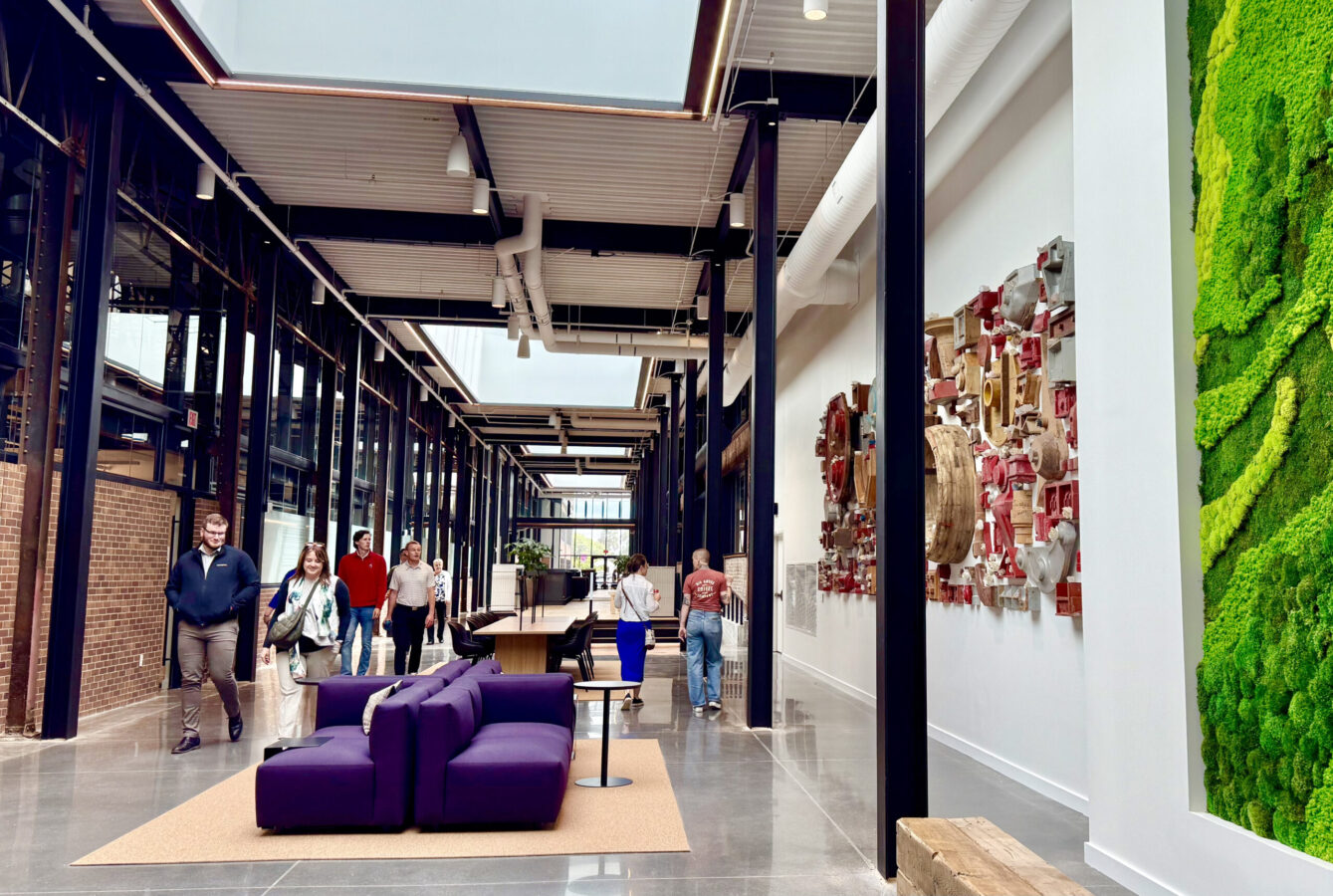 The Catalyst adaptive reuse project in midtown Omaha is to get an award at this year’s CRE Summit. Shown here is a corridor of the co-working hub, which used to be an alleyway on an old steel plant campus. The building is expected to be a magnet for innovative health care businesses.<br />(Cindy Gonzalez / Nebraska Examiner)