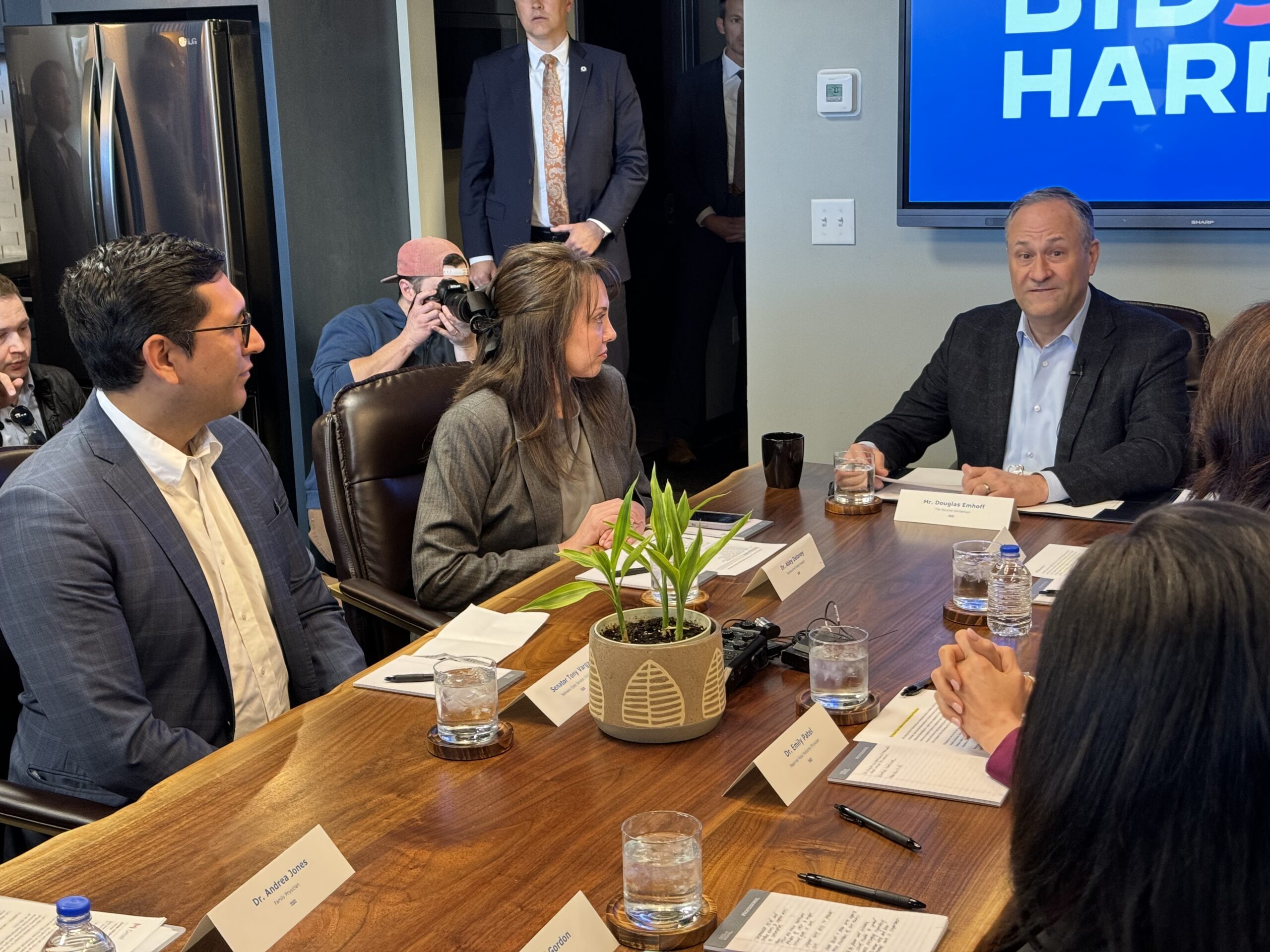 State Sen. Tony Vargas of Omaha (left), a House candidate in Nebraska’s 2nd District, speaks to second gentleman Doug Emhoff in Omaha in March.<br />(Aaron Sanderford / Nebraska Examiner)