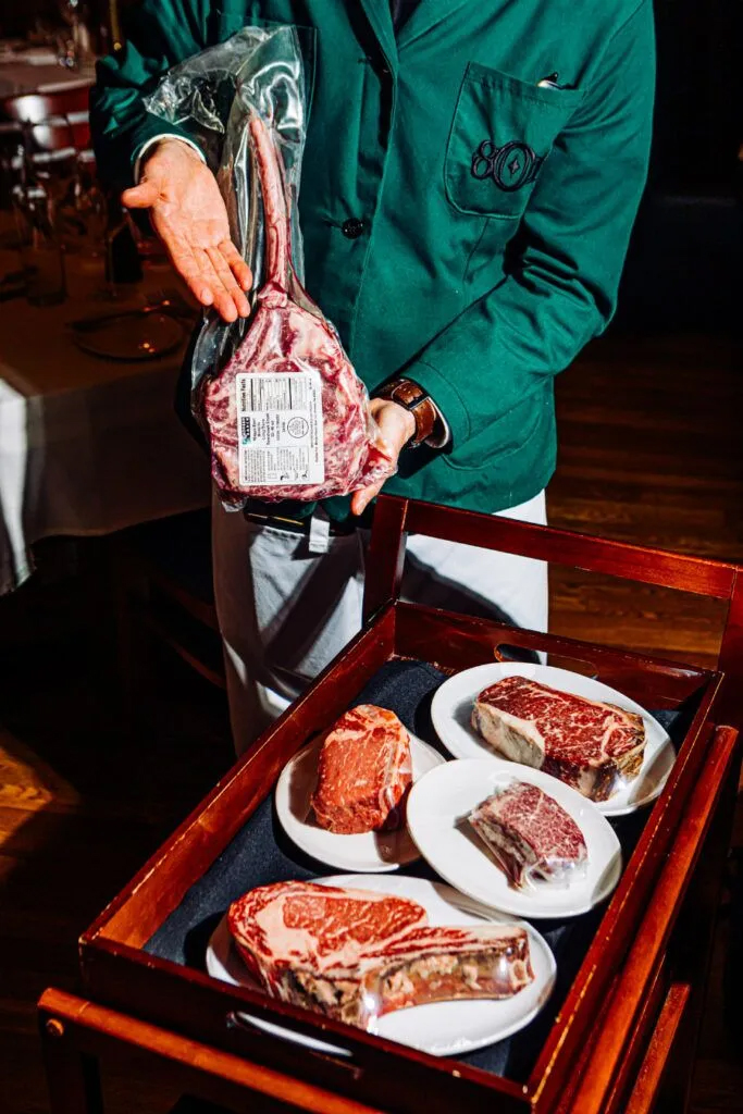 Servers circulate the dining room with the 801 meat cart and present a variety of special cuts to diners.<br />(Joshua Foo / Flatwater Free Press)