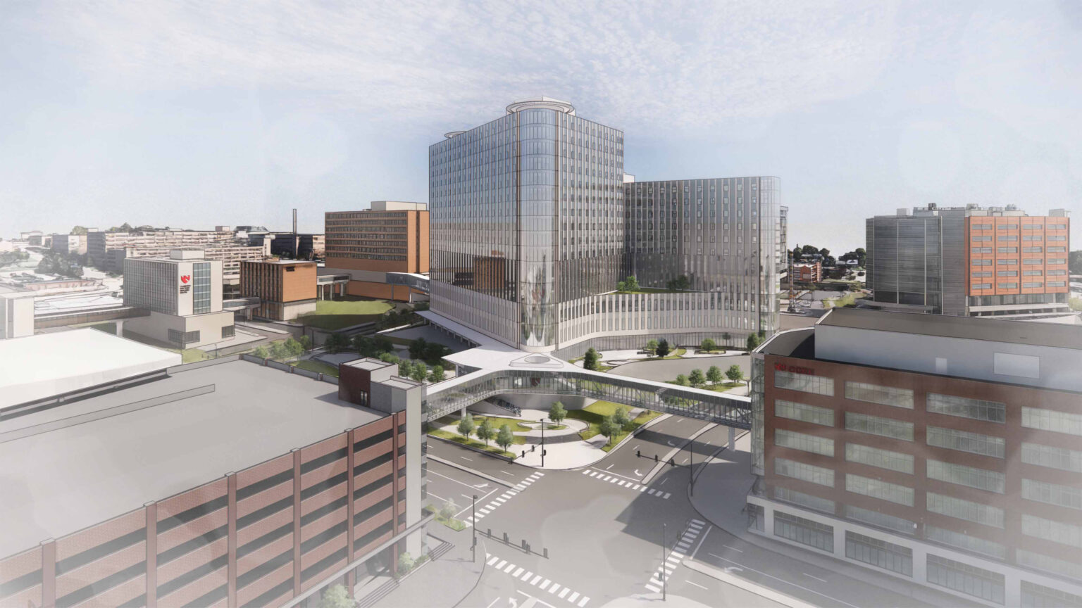 Rendering of the future Project Health facility — the glass structure connected by pedestrian skywalks to a future parking garage and the CORE building that’s under construction on the west side of Saddle Creek Road in what is dubbed The Edge District.<br />(Courtesy of University of Nebraska Medical Center)