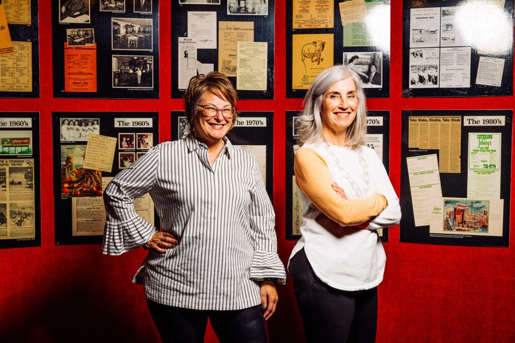 Sisters Sally Kawa (left) and Kari Harding run the day-to-day business of the restaurant along with their father, Jack Kawa. His father, Frank Kawa, founded the restaurant in 1922.<br />(Joshua Foo / Flatwater Free Press)