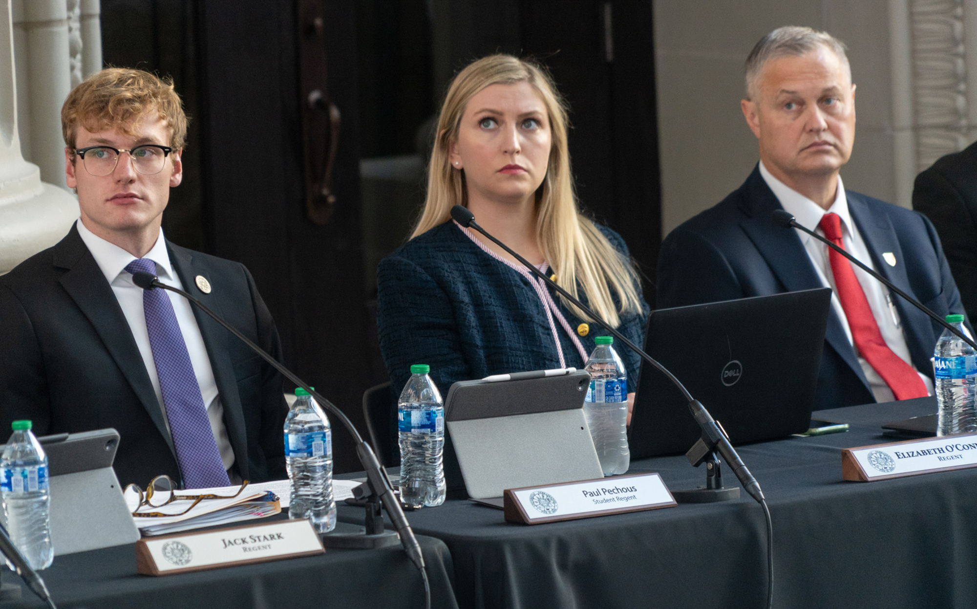 From left: now-former UNL Student Regent Paul Pechous and Regents Elizabeth O’Connor of Omaha and Rob Schafer of Beatrice, Oct. 5, 2023.<br />(Zach Wendling / Nebraska Examiner)