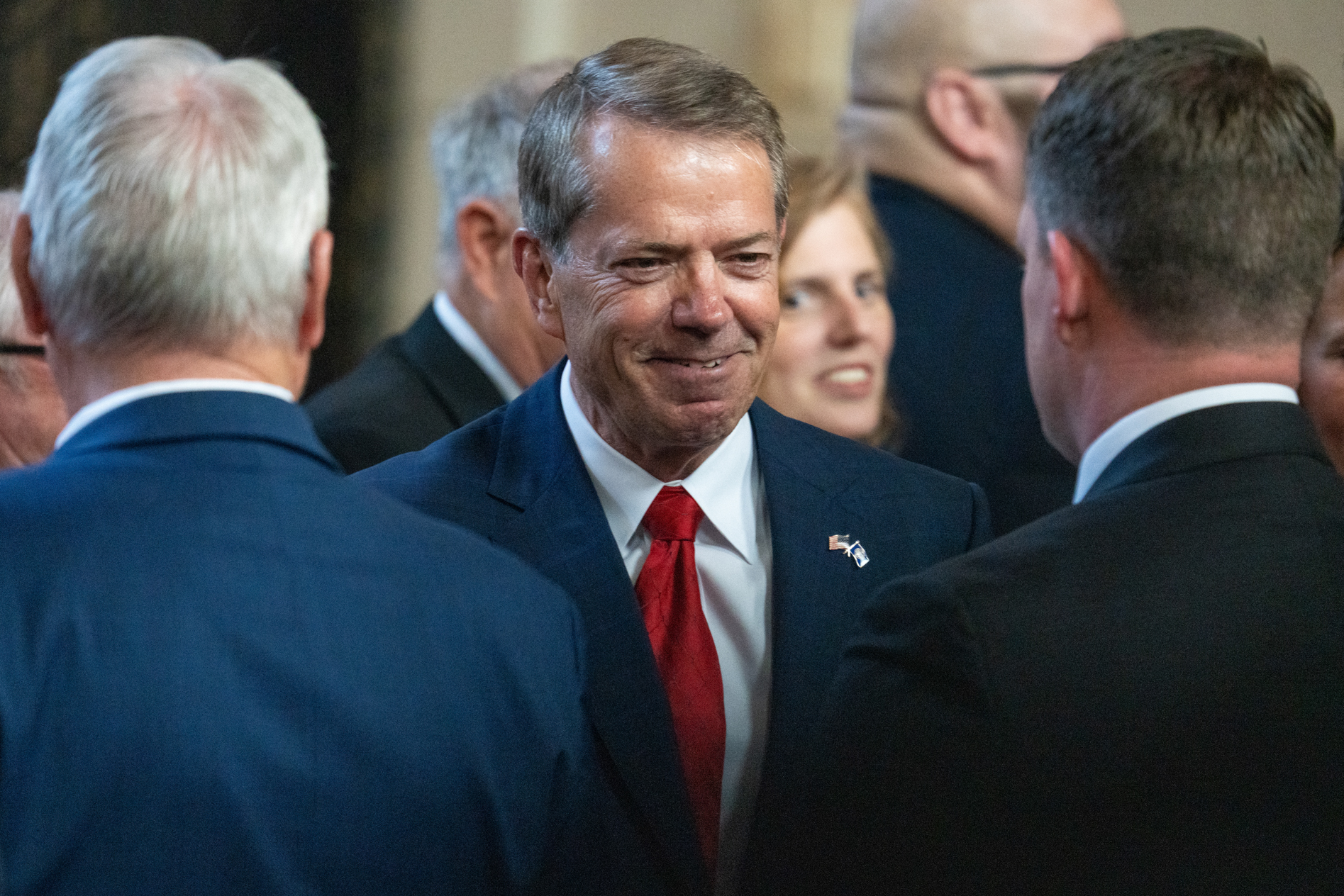 Nebraska Gov. Jim Pillen greets State Sen. Ben Hansen of Blair, June 2, 2025.<br />(Zach Wendling / Nebraska Examiner)