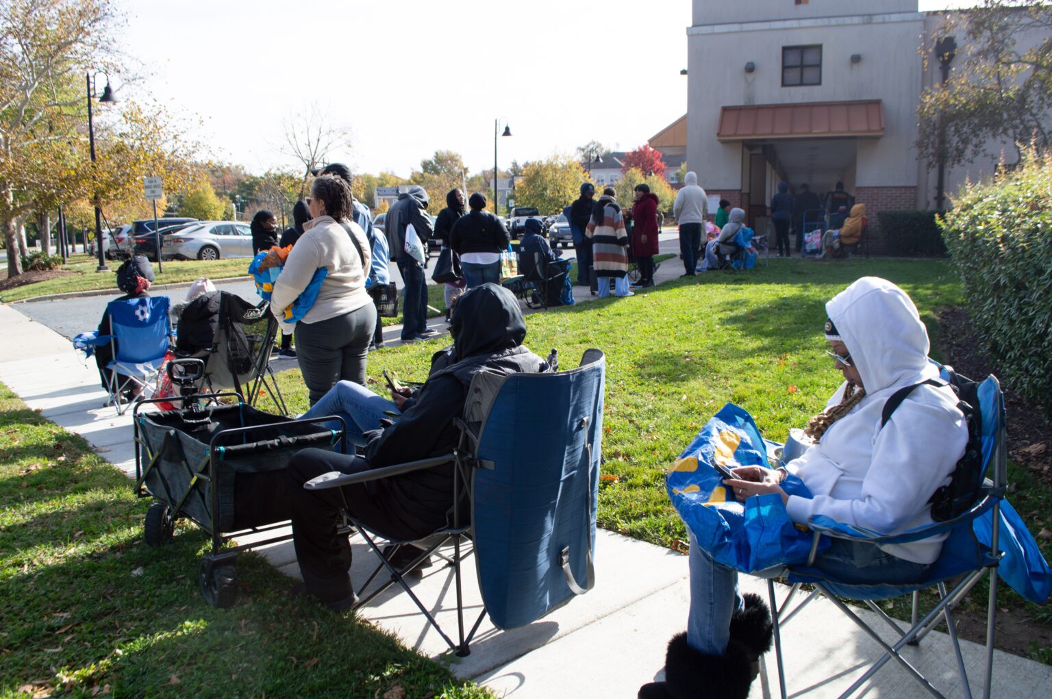Furloughed federal workers stand in line for hours ahead of a special food distribution by the Capital Area Food Bank and No Limits Outreach Ministries on Barlowe Road in Hyattsville, Maryland, on Tuesday, Oct. 28, 2025.<br />(Ashley Murray / States Newsroom)
