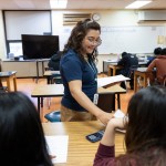 Dorina Ramos es out a worksheet while teaching a lesson in a physical science class in Schuyler, Neb., on May 2, 2025. A group of teachers from the Philippines moved to Schuyler to teach under H-1B visas this year.
(Rebecca S. Gratz / Flatwater Free Press)
