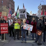 Protesters gather outside federal court ahead of a hearing for Mohsen Mahdawi, a Palestinian man arrested at a Vermont immigration office during an interview about finalizing his U.S. citizenship and a legal permanent resident who led protests against the war in Gaza at Columbia University, Wednesday, April 23, 2025 in Burlington, Vt. 
(Amanda Swinhart / AP Photo)