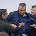 U.S. Sen. Alex Padilla, D-Calif., is pushed out of the room as Homeland Security Secretary Kristi Noem holds a news conference regarding the recent protests in Los Angeles, Thursday, June 12, 2025. 
(David Crane / The Orange County Register via AP)