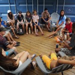 Maui Hero Project and with Kahākūkahi Ocean Academy members talk after their water academy day in Lahaina, Hawaii, on Tuesday, June 10, 2025. 
(Kevin Fujii / Honolulu Civil Beat via AP)