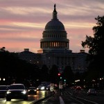 The U.S. Capitol is seen at sunrise as cars drive on Pennsylvania Ave. during rush hour traffic, Wednesday, Oct. 1, 2025, in Washington. 
(Julia Demaree Nikhinson / AP Photo)