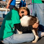 Katelynn Aldarondo says goodbye to the nameless dog she grew close to, Nov. 23, 2025, at Culpeper Regional Airport in Brandy Station, Va.
(Allison Robbert / AP Photo)