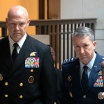 U.S. Navy Adm. Frank M. Bradley, accompanied by Gen. Dan Caine, chairman of the Joint Chiefs of Staff (right) walks to a meeting with senators on Capitol Hill, Thursday, Dec. 4, 2025, in Washington. 
(Mark Schiefelbein / AP Photo)