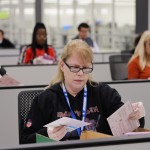 A worker examines ballots at the L.A. County Ballot Processing Center Nov. 4, 2025, in City of Industry, Calif. 
(Ethan Swope / AP Photo)
