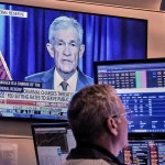A video of Federal Reserve Chair Jerome Powell plays on a screen on the floor of the New York Stock Exchange, Monday, Jan. 12, 2026. 
(AP Photo / Richard Drew)