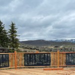 Decorative deck panels, like those shown here on a customer’s deck, are among hand-made products by the FabriPlas Metal shop, launched by a husband and wife team in Bennet, Nebraska. It is among a handful of small manufacturers to be awarded a modernization grant from the Nebraska Department of Labor that’s intended to help boost productivity and workforce development. (Courtesy of FabriPlas Metal)