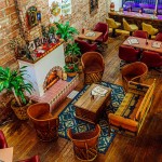 Masa Luna opened in September in Omaha's Little Bohemia to much buzz, reviewer Sarah Baker Hansen writes. The restaurant has a singular retro-fun look with a “your grandparents’ basement but cooler” vibe, she says. 
(Joshua Foo / Flatwater Free Press)