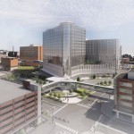 Rendering of the future Project Health facility — the glass structure connected by pedestrian skywalks to a future parking garage and the CORE building that’s under construction on the west side of Saddle Creek Road in what is dubbed The Edge District. 
(Courtesy of University of Nebraska Medical Center)
