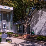 The pay phone outside the Pierce Telephone Co. in Pierce wasn’t working when someone tried to use it, so Jeff Kesting, the phone company’s plant manager, fixed the problem so the phone would work again. 
(Darin Epperly / Flatwater Free Press)