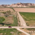 Rural letter carrier Roger McDonald prefers to drive a Dodge Caravan on his rural route, located in Scotts Bluff County, Neb. The area is known for its beautiful rugged bluffs and some native prairie grasses. 
(Nick Loomis / The Midwest Newsroom)