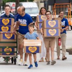 Advocates for a minimum degree of paid sick leave for Nebraska workers brought boxes of petition signatures to downtown Lincoln before bringing them to the Nebraska Secretary of State’s Office on June 27, 2024. 
(Zach Wendling / Nebraska Examiner)