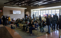 People seeking assistance after the Tyson closure wait their turn in the lobby of the Dawson County Opportunity Center on Jan. 26. The local unemployment office estimated that staff helped 500 people in just two days. 
(Brian Neben / Flatwater Free Press)
