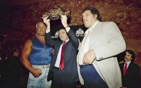 Real estate developer Donald Trump holds the World Wrestling Federation Championship belt as he flanked by Wrestlers Hulk Hogan, left and Andre the Giant at a news conference Tuesday, March 15, 1988 in New York announcing "WrestleMania IV"on March 27 at Trump Plaza in Atlantic City. 
(Susan Ragan / AP Photo)