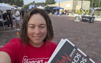 In this June 2023 selfie, Angie Lauritsen collects signatures in downtown Gretna, Neb., for a ballot initiative seeking to repeal a state law that would divert taxpayer money to pay for private school tuition. Nebraska lawmakers are set for the first time to pass a bill that would block the public from voting on a ballot measure initiated by citizens of the state, setting up what could be a long battle over whether to fund private school tuition with public dollars. 
(Angie Lauritsen via AP)
