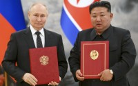 Russian President Vladimir Putin (left) and North Korea's leader Kim Jong Un pose for a photo during a signing ceremony of the new partnership in Pyongyang, North Korea, on Wednesday, June 19, 2024. 
(Kristina Kormilitsyna / Sputnik / Kremlin Pool Photo via AP)