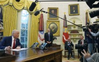 President Donald Trump (from left) speaks while signing an executive order as Commerce Secretary nominee Howard Lutnick, Rupert Murdoch and Larry Ellison, chairman and chief technology officer of Oracle Corporation, listen in the Oval Office of the White House, Monday, Feb. 3, 2025, in Washington. 
(Evan Vucci / AP Photo)