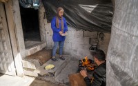 Rawia Tambora and her husband Ahmed prepare a meal in their home in Beit Lahiya, northern Gaza Strip, Friday, Feb. 21, 2025. 
(Abdel Kareem Hana / AP Photo)