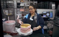 An employee makes a cake inside Walmart Supercenter on Wednesday, May 28, 2025, in North Bergen, N.J.
 (Andres Kudacki / AP Photo)