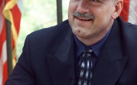 Minnesota Gov. Jesse Ventura smiles as he autographs copies of his book, "I Ain't Got Time to Bleed: Reworking the Body Politic from the Bottom Up," at the Richard Nixon Library & Birthplace in Yorba Linda, Calif., Thursday, May 27, 1999. 
(Kevork Djansezian / AP Photo)