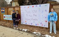 The Marshall Fire impacted people of all ages. Rebecca Slusar organized her children and their friends in the neighborhood to paint signs of community resilience and thanking first responders. 
(Courtesy of the Louisville Historical Museum)