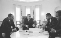 President Lyndon B. Johnson meets with Civil Rights leaders including Martin Luther King. Jr., January 18, 1964. (Lyndon B. Johnson Presidential Library, National Archives)