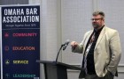 Matthew Garlinghouse, a professor of neuropsychology at the University of Nebraska Medical Center, addresses the crowd at the Medical Legal Dinner, a joint event held by the Omaha Bar Association and Metro Omaha Medical Society, on Thursday, March 5, 2020. (Photo by Scott Stewart)