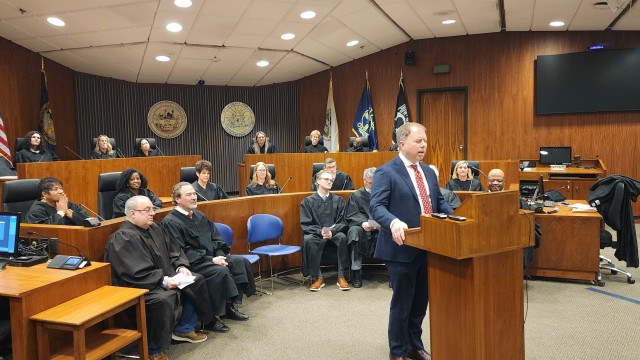 Hon. Richard McGowan discusses the importance and honor of serving as a judge, while other Douglas County judges listen.
(Tim Trudell / The Daily Record)