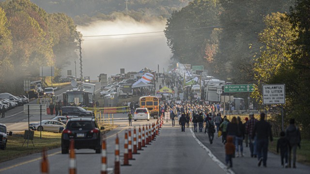 Fog covers the New River Gorge Bridge as people make their way to the annual Bridge Day festival in Fayetteville, WVa., on Saturday Oct. 19, 2019. The New River Gorge is the site of the annual Bridge Day festival, where many gather to watch people base jump into the gorge. The river became New River Gorge National Park and Preserve in 2020.
(F. Brian Ferguson / Charleston Gazette-Mail via AP)