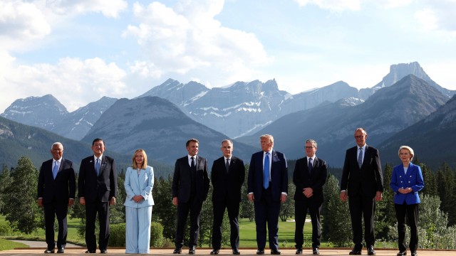 European Council President Antonio Costa (from left) Japan's Prime Minister Shigeru Ishiba, Italian Prime Minister Giorgia Meloni, French President Emmanuel Macron, Canada's Prime Minister Mark Carney, U.S. President Donald Trump, Britain's Prime Minister Keir Starmer, German Chancellor Friedrich Merz and European Commission President Ursula von der Leyen pose for a family photo during the G7 Summit, in Kananaskis, Alberta, Monday, June 16, 2025. 
(Suzanne Plunkett / Pool Photo via AP)